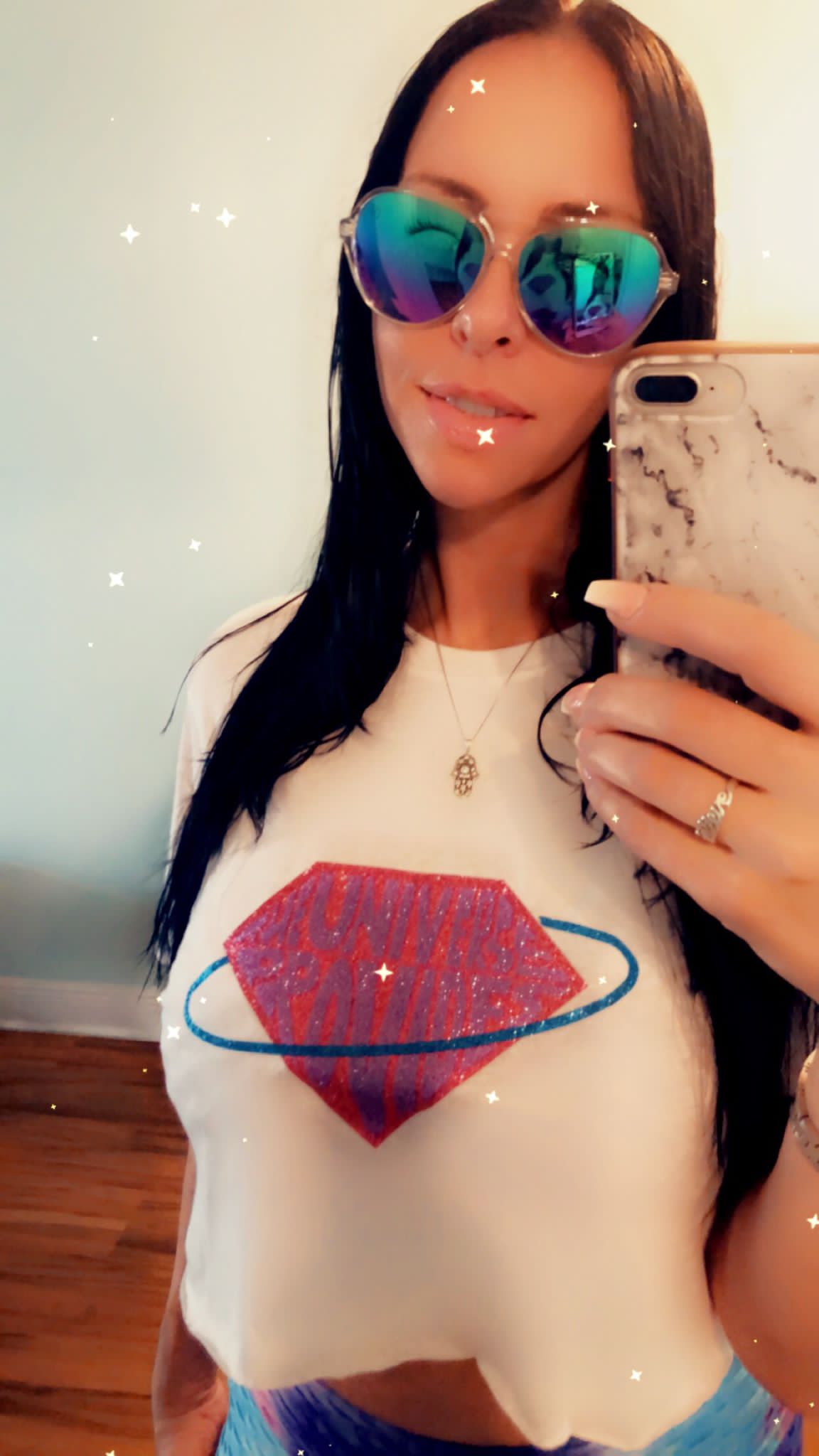 The universe provides White crop tee and purple logo